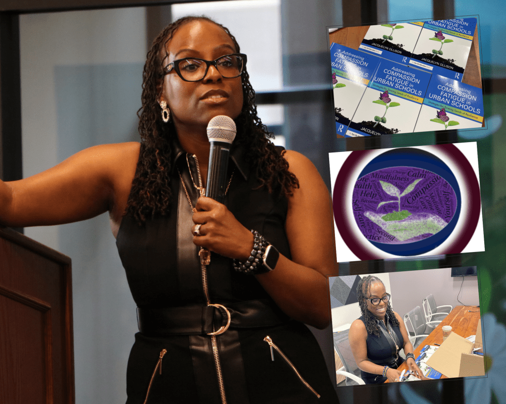 Dr. J presenting at a conference with a microphone, gesturing towards the audience.